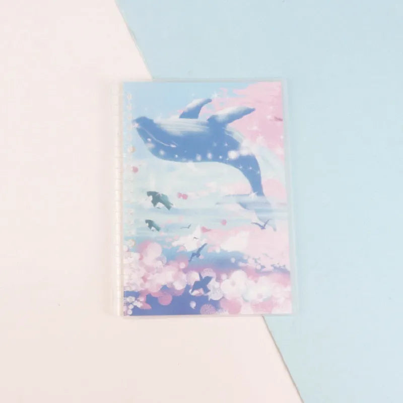Hard cover A5 and B5 notebook with animal painting designs like whales and fruit, showing coil binding.