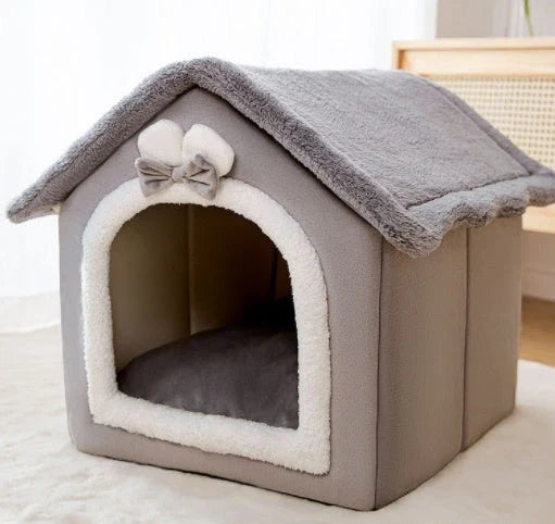 A cozy and comfortable pet bed with a self-warming fabric, durable non-slip base, and removable machine-washable cover