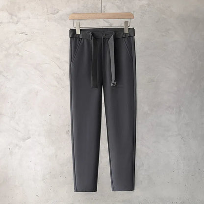 Boys slim straight wool trousers in a tapered fit, shown in a light grey colour.