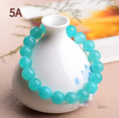 Natural blue-green Amazonite scattered beads in various sizes from 6mm to 13mm diameter for jewellery making