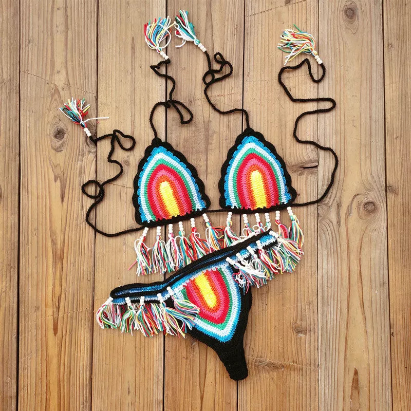 Handmade crochet bikini swimsuit with rainbow tassel detailing, perfect for summer beach outings.
