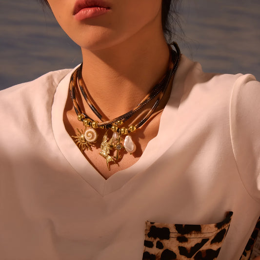 Geometric leopard print pendant on a stainless steel chain necklace for women.