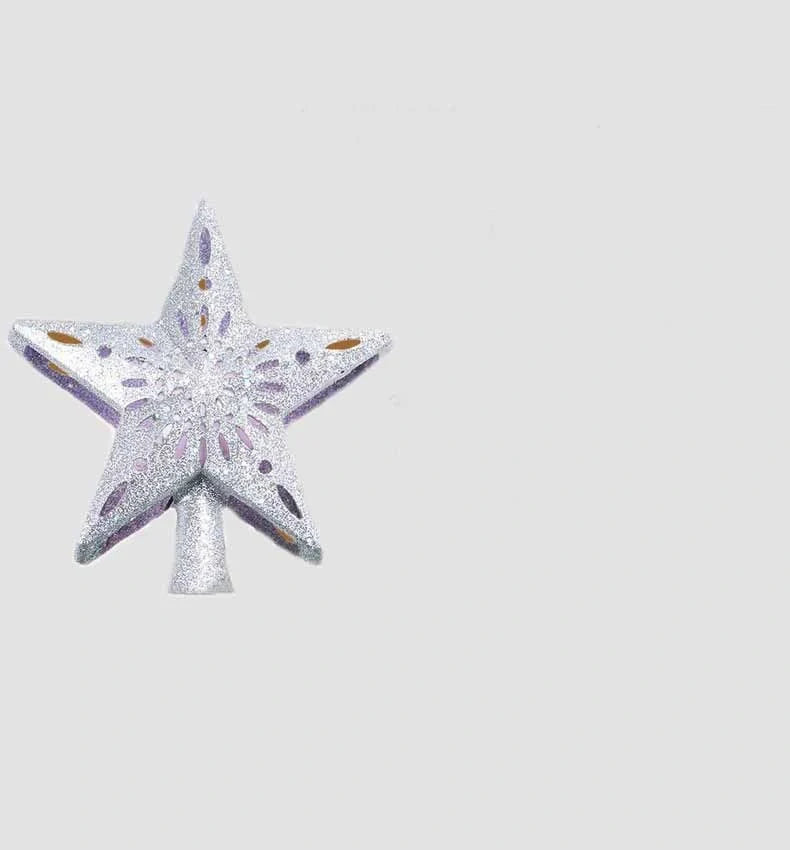 3D Glitter Silver Snow Christmas Tree Topper with LED Snowflake Projector illuminating a room with festive patterns
