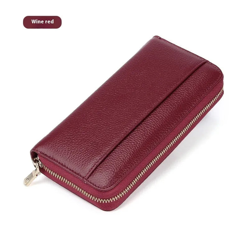 Long genuine leather women's wallet in solid colours with 12 card slots and anti-theft design