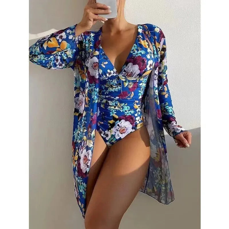 Women's floral print bikini three-piece swimsuit set with matching coat in a selection of colours.