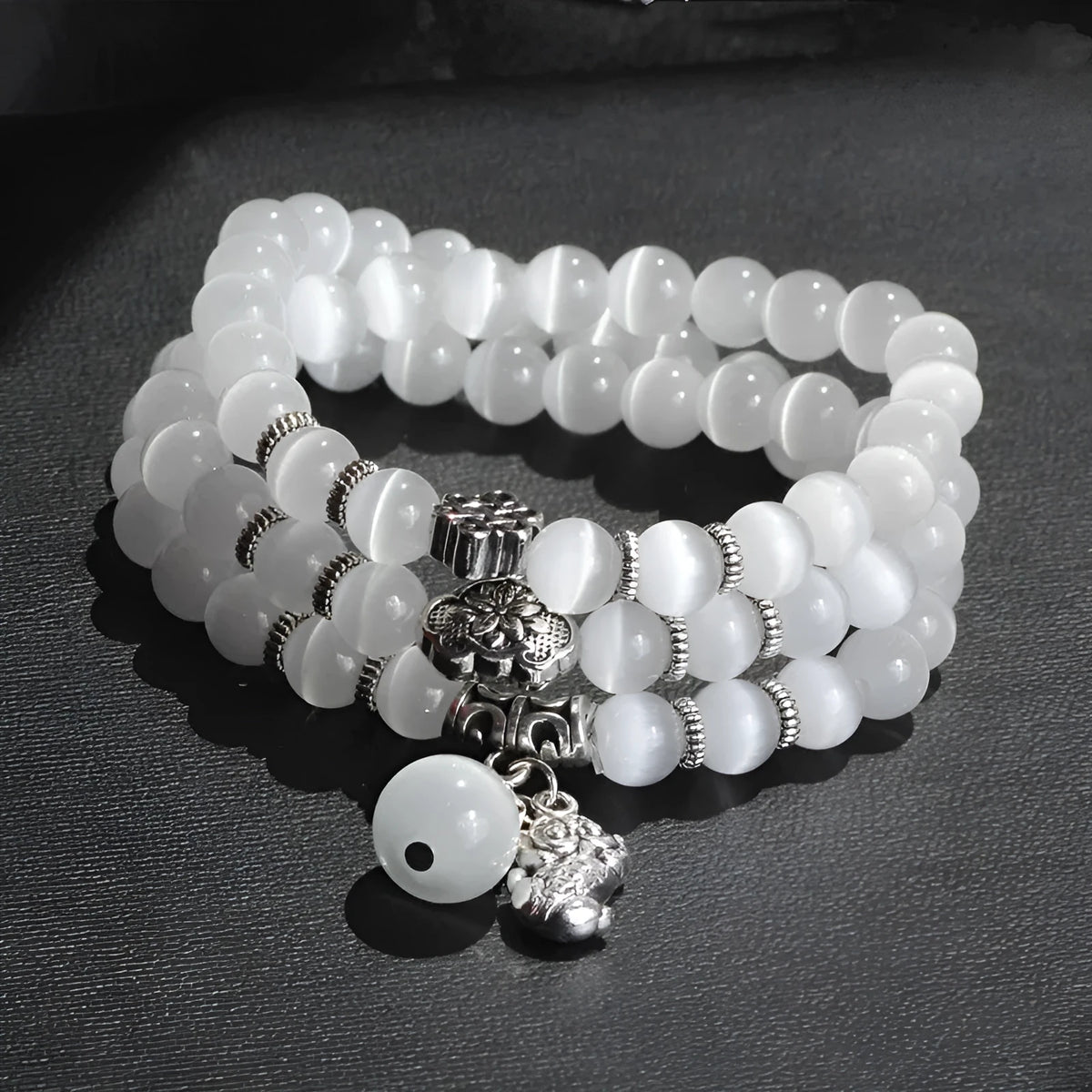 Women's opal crystal bracelet with lucky cat charm and geometric design, shown in blue colour option