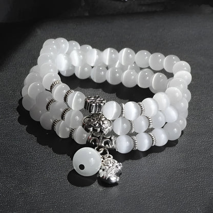 Women's opal crystal bracelet with lucky cat charm and geometric design, shown in blue colour option
