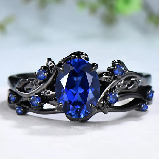 Geometric gun black couple ring with navy blue rhinestones on copper base