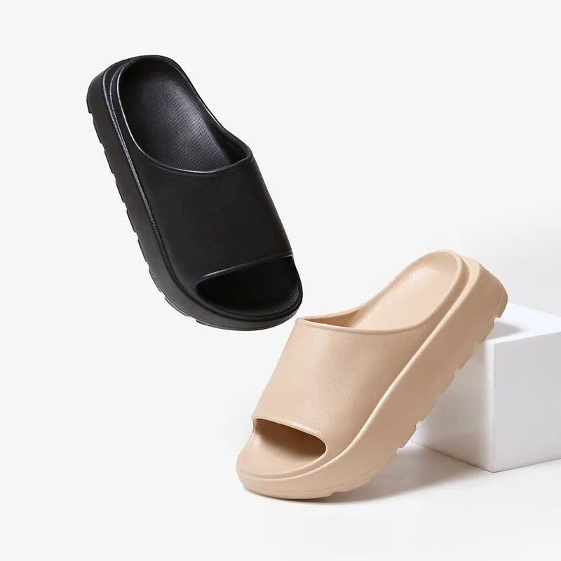 Women's beige 5.5cm thick-soled EVA slippers with injection-moulded construction for bathroom and beach use