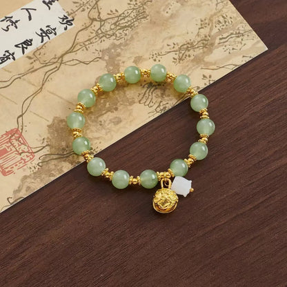 Coloured glaze Chinese temple fair bracelet with leaf, star, and bow charms on baking varnish finished mixed materials