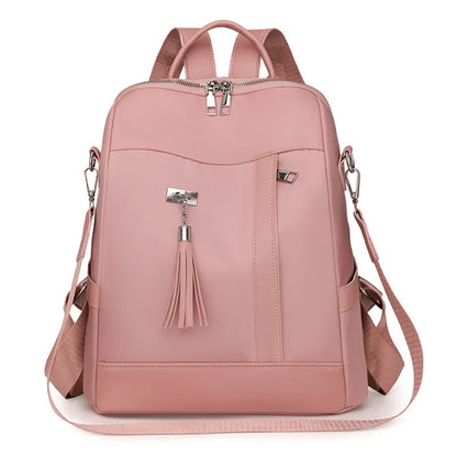 Soft PU commute backpack in light pink colour showing mobile phone pocket and three-dimensional storage design