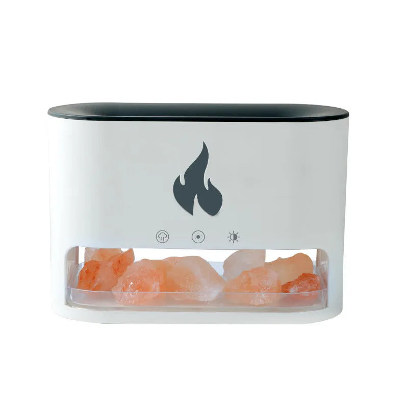 White square flame humidifier with colourful 3D light effect and crystal salt stone on a desk.