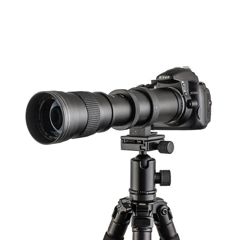 420-800mm manual telephoto zoom camera lens with silver barrel and T-mount adapter ring.