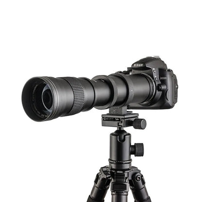 420-800mm manual telephoto zoom camera lens with silver barrel and T-mount adapter ring.