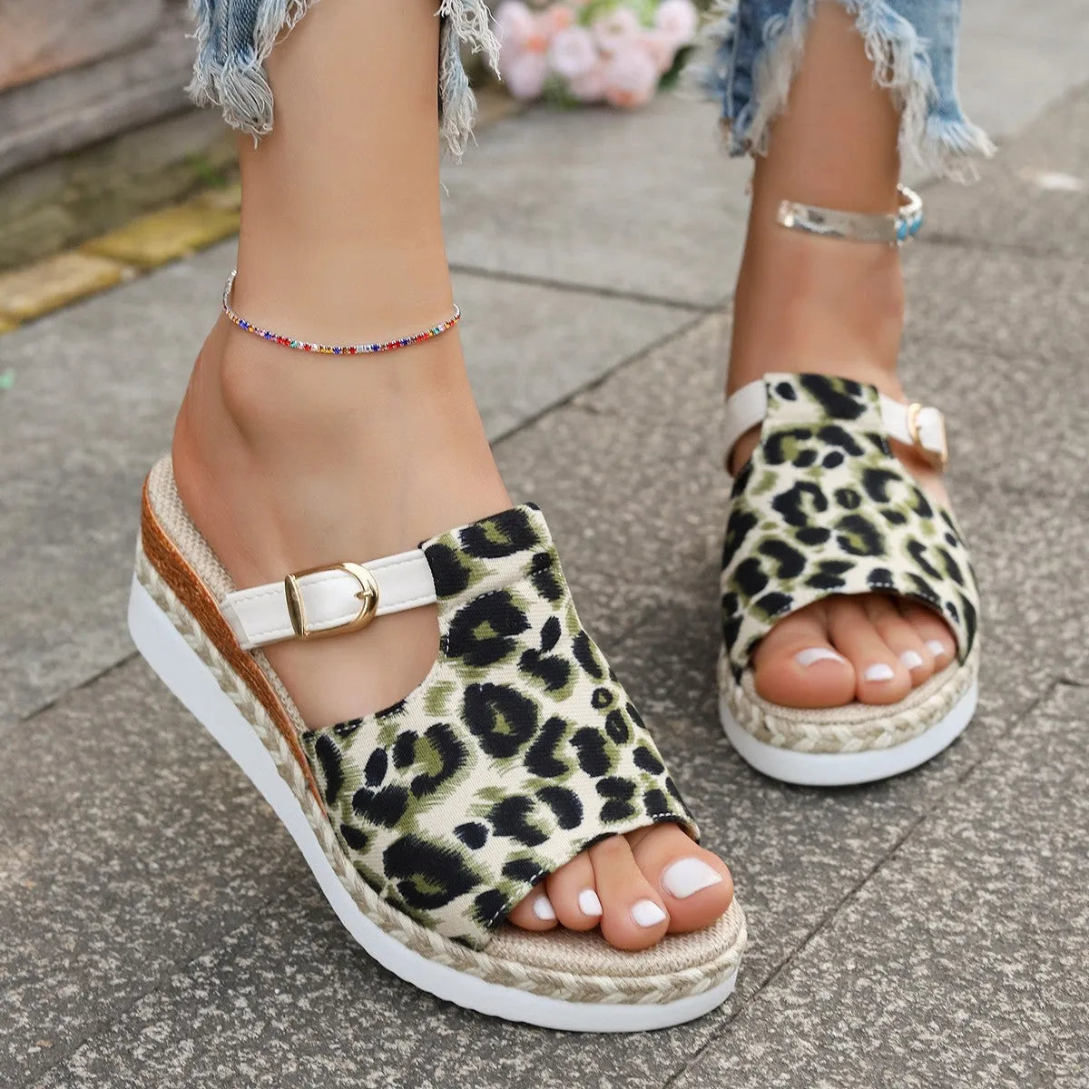 Leopard print wedge platform sandals with a fish mouth toe, shown in light green colour.