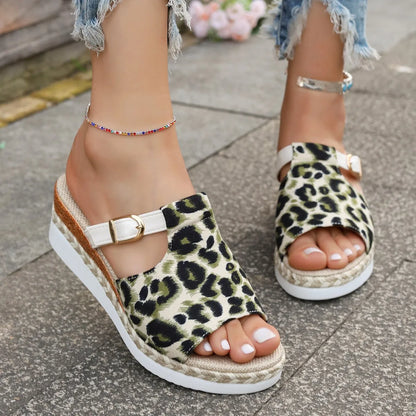Leopard print wedge platform sandals with a fish mouth toe, shown in light green colour.