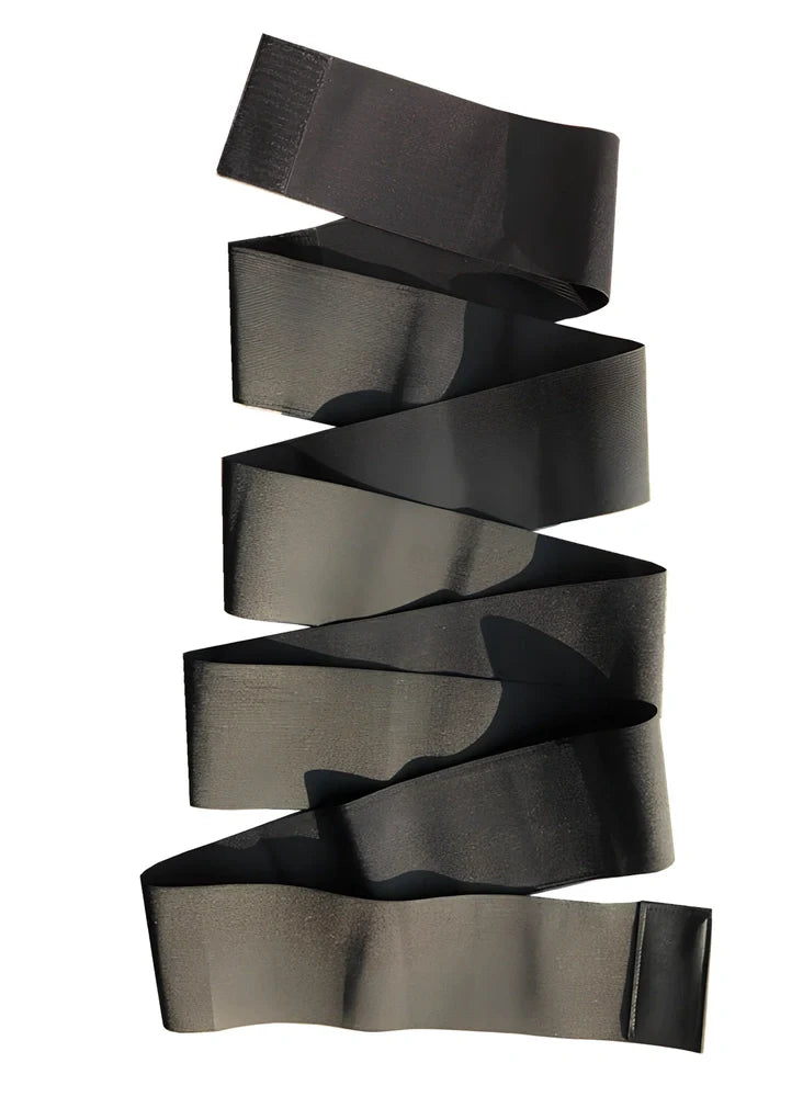 Red and black polyester waist training belt with binding strap for body sculpting