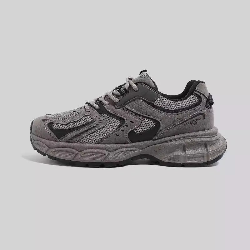 Grey platform casual sneaker with PU mesh upper, leather stitching, and a flat EVA sole.