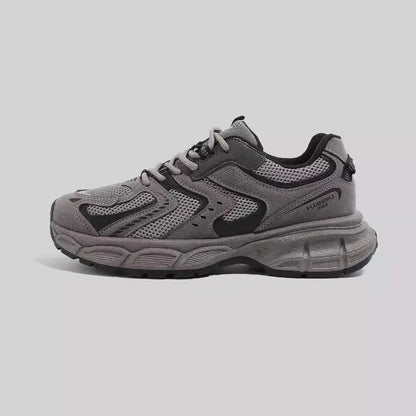 Grey platform casual sneaker with PU mesh upper, leather stitching, and a flat EVA sole.