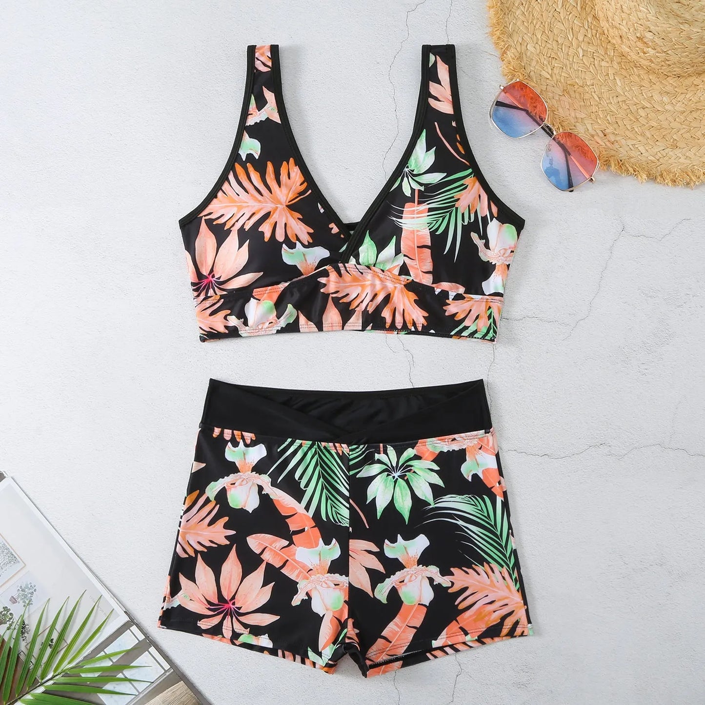 Women's two-piece printed swimsuit set with boxer-style briefs and sleeveless top in multi-colour pattern