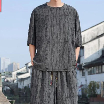 Men's black and grey knitted short-sleeve top with matching loose cropped trousers casual suit set
