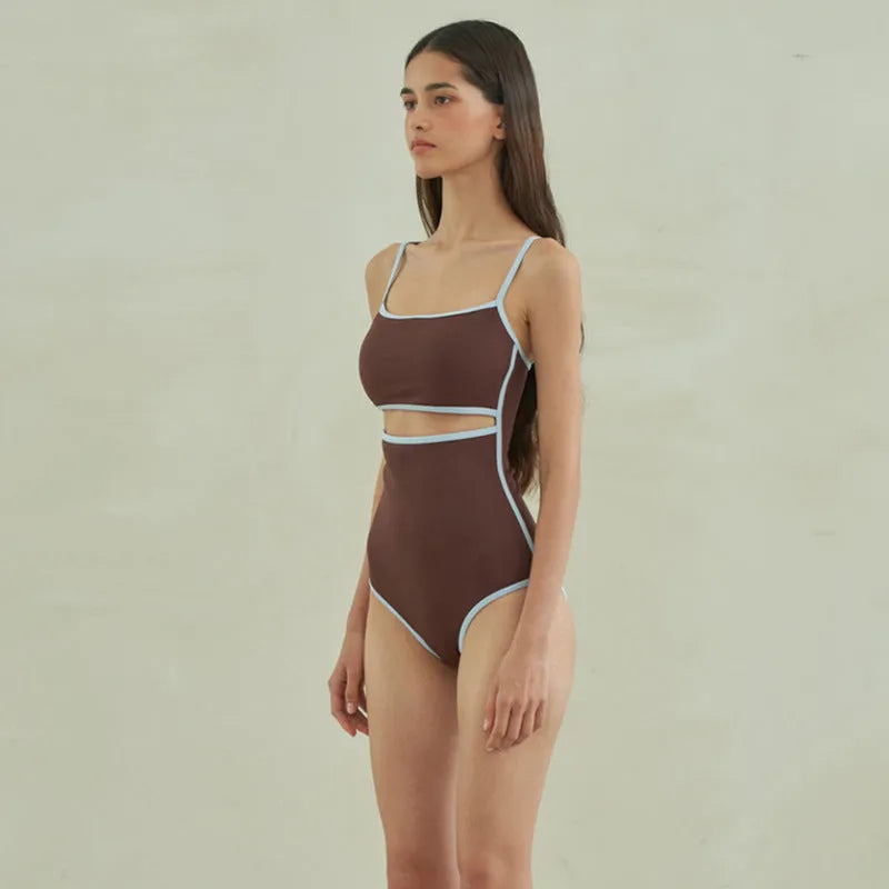 Triangle one-piece swimsuit for women in brown, featuring a nylon fabric construction with a V-front and adjustable ties for a customisable, supportive fit in sizes M, L, and XL.