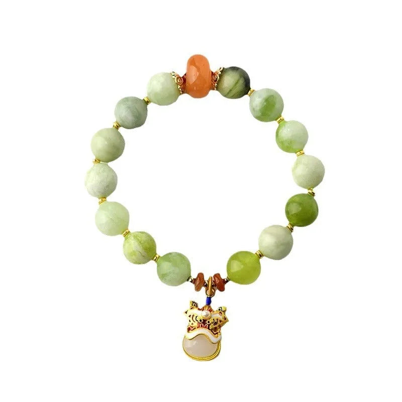 Green milk-in-water Xingshi jade pendant bracelet with geometric retro design on wrist