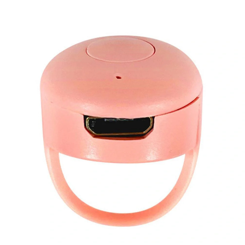 Bluetooth Remote Control Ring for mobile phones in yellow, blue, and pink colors