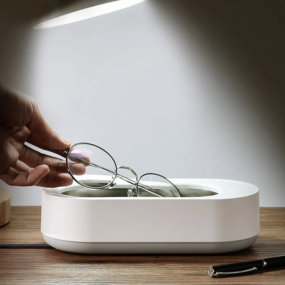 White portable ultrasonic cleaner with stainless steel tank for cleaning jewellery and glasses