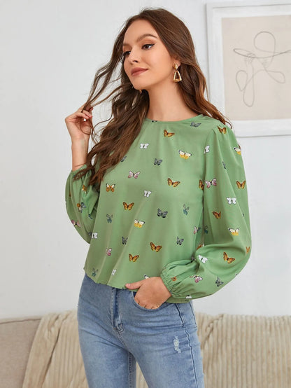 Women's loose fit long-sleeved shirt with colourful butterfly print in green colour option
