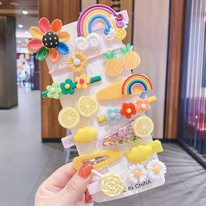 14-piece toddler hair accessories set showing colourful candy rainbow barrettes, fruit clips, and butterfly hair pins