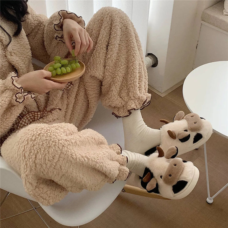 Women's cow slippers with plush faux fur lining and non-slip PVC sole in sizes 36-45 for winter indoor warmth, soft and lightweight funny animal cartoon house shoes in white or coffee colour