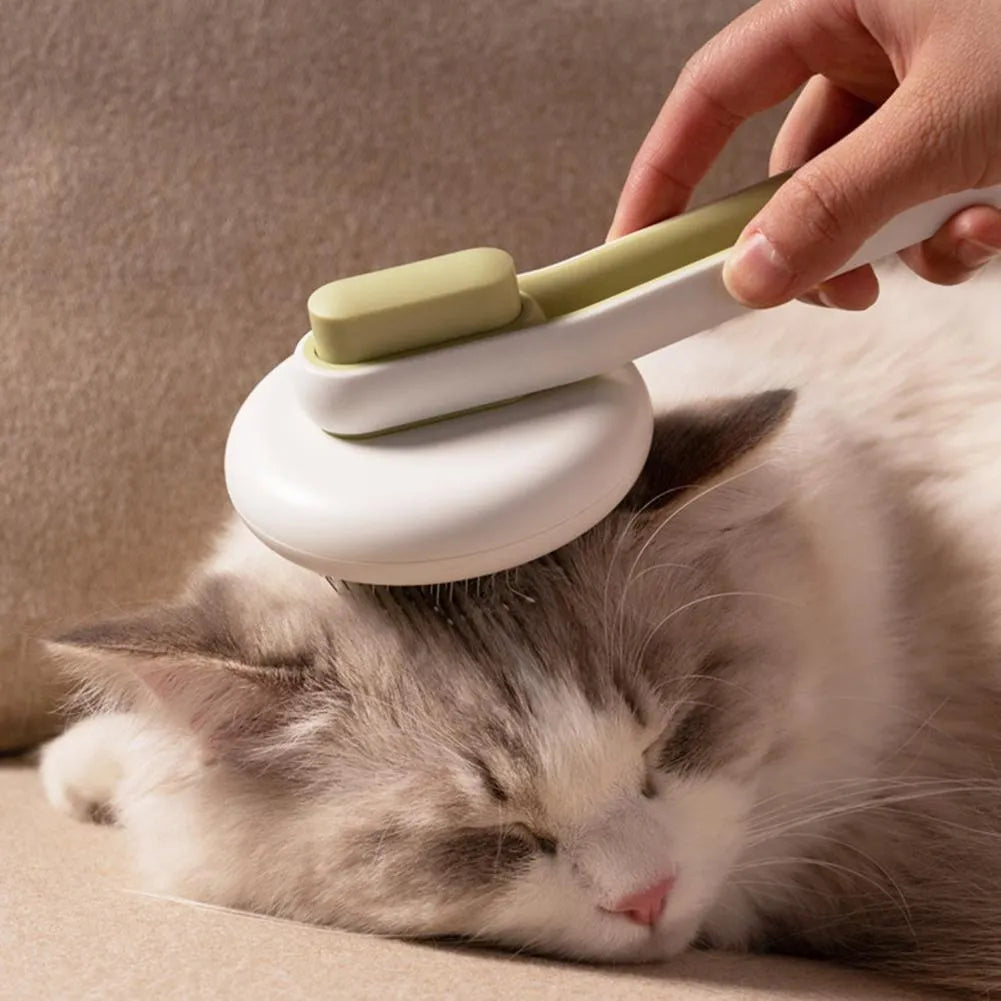 Automatic pet grooming comb with stainless steel pins and hair release button in candy colours