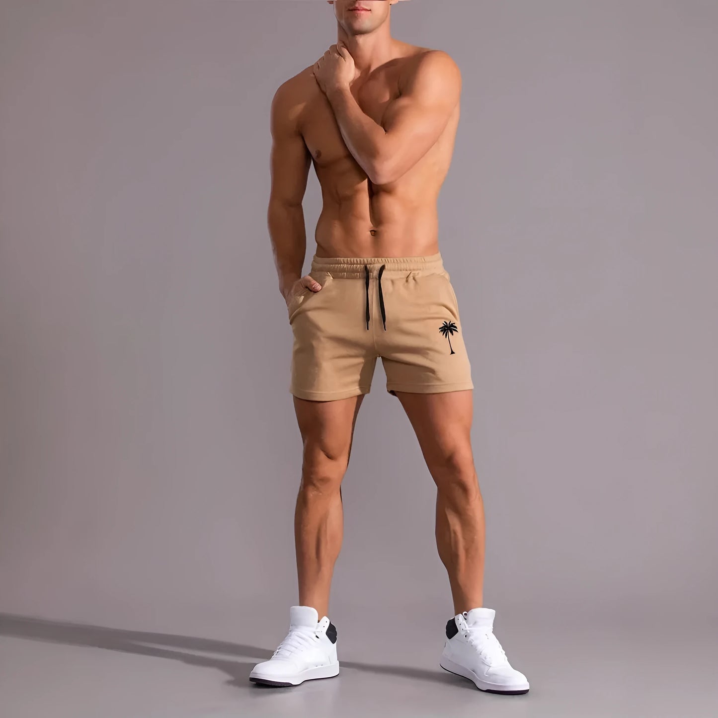 Khaki coconut print men's sports shorts with elastic waistband and straight leg design
