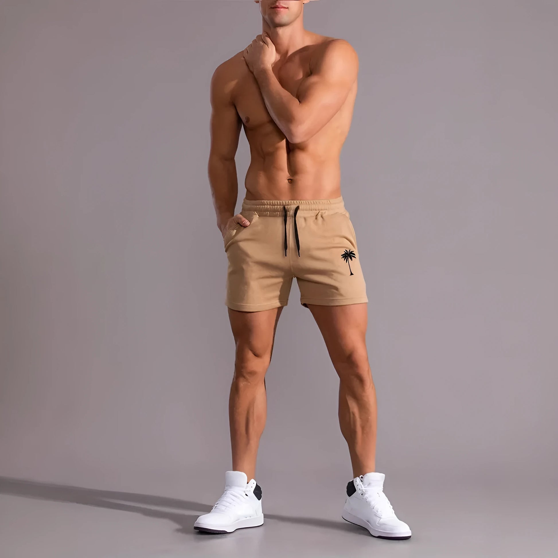 Khaki coconut print men's sports shorts with elastic waistband and straight leg design