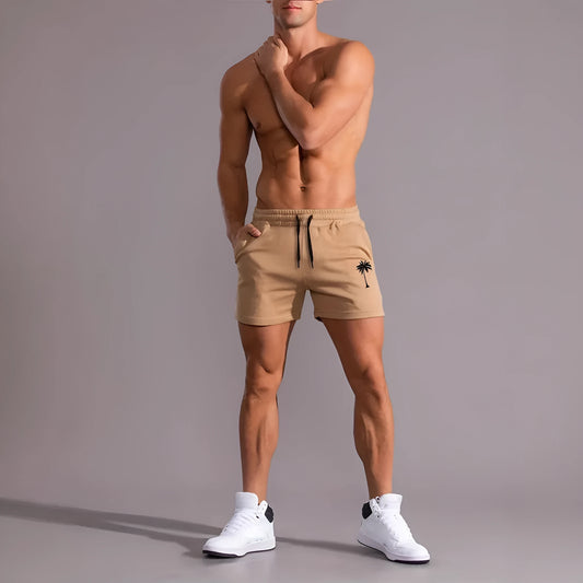 Khaki coconut print men's sports shorts with elastic waistband and straight leg design