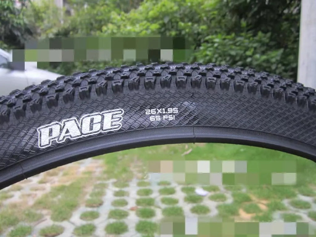 Mountain bike tyre with ultralight design, showing tread pattern and white label option, sizes from 26 to 29 inches.