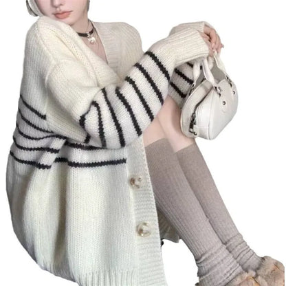 Collar button cardigan in a 3D texture pattern, shown in a neutral colour with a full button front.
