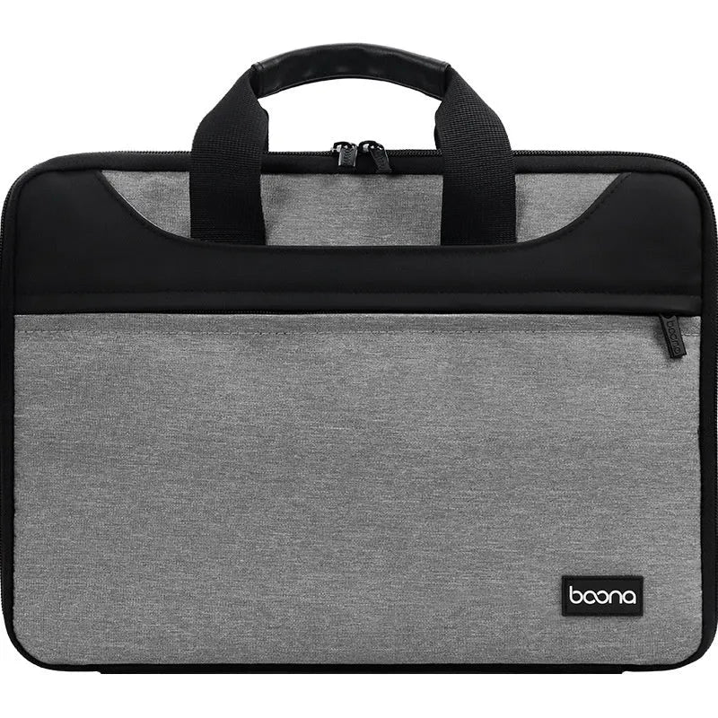 Black full zip opening Oxford cloth laptop bag for business travel with a soft carry handle.