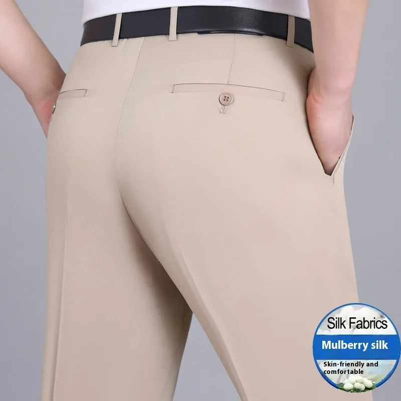 Men's dark blue high-waisted straight-leg non-ironing trousers made from a silk blend fabric.