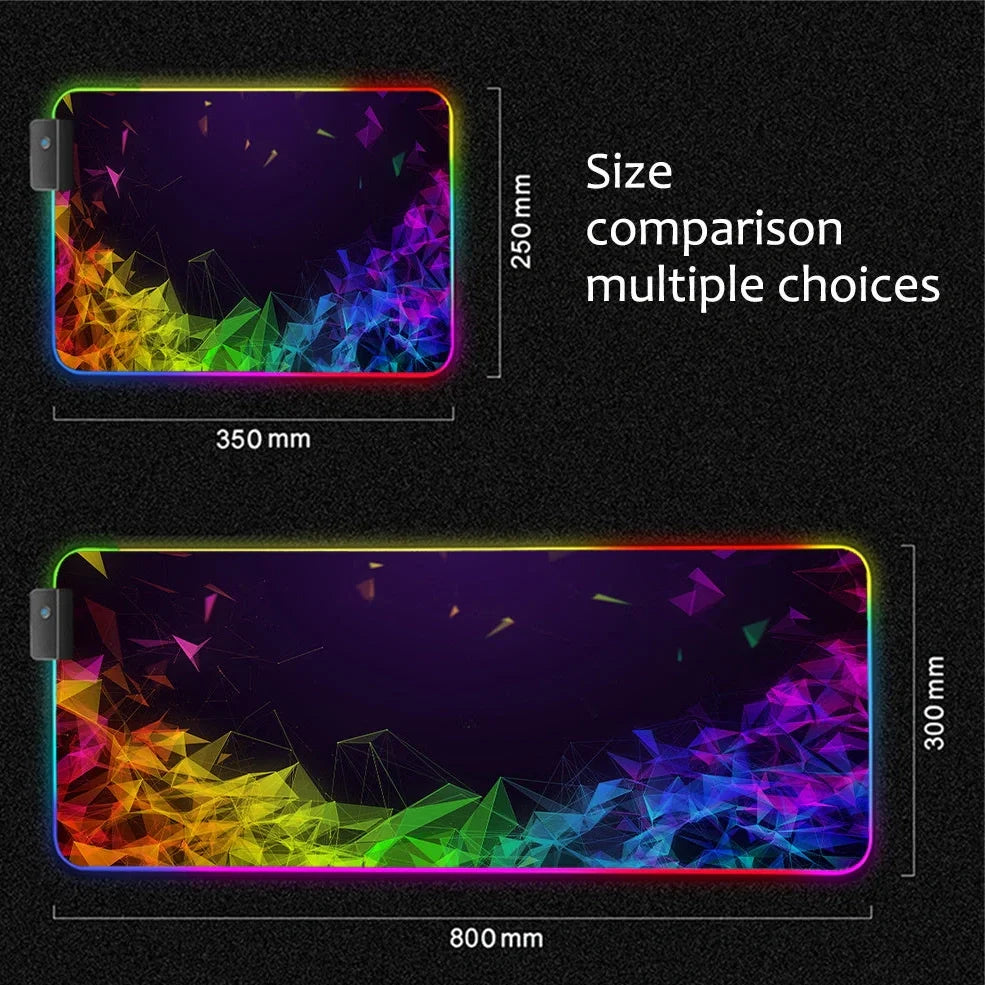 Black RGB gaming mouse pad with illuminated surface measuring 900x400mm and 4mm thickness