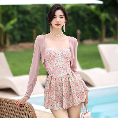 Women's floral jumpsuit swimsuit with adjustable suspender straps in pink or green colour options