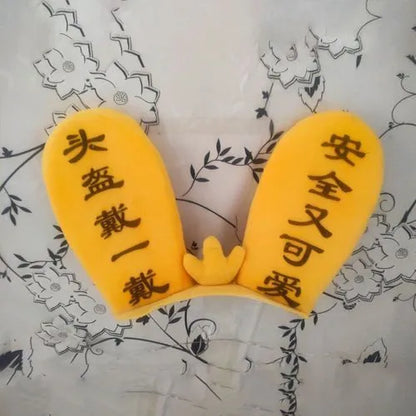 Rabbit ear ski helmet ornament with LED lighting and Velcro base attachment for helmet customisation