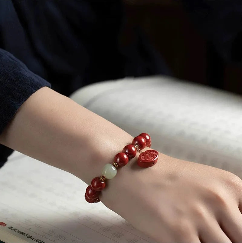 Natural cinnabar Emperor sandstone bracelet in 8mm and 10mm bead sizes.