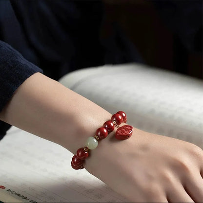 Natural cinnabar Emperor sandstone bracelet in 8mm and 10mm bead sizes.