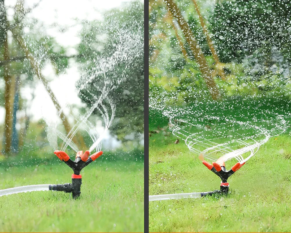 Orange automatic rotating garden sprinkler measuring 14cm diameter x 26.5cm height
