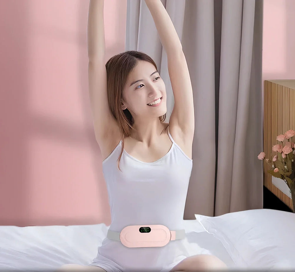 White electric heating belt with lumbar support showing USB connection and control buttons