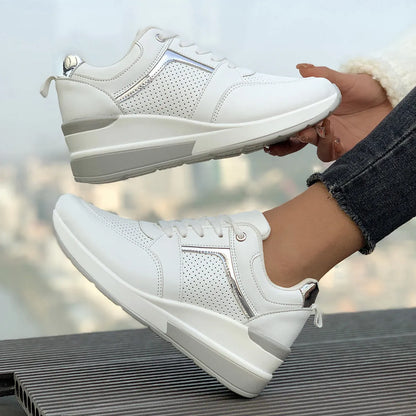 Women's white PU leather wedge platform sports shoes with front lace-up closure.