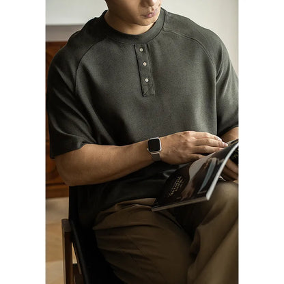 Casual pullover top with terry texture fabric in smoky gray colour showing raglan sleeve design