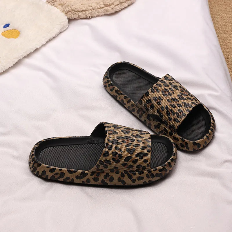 Women's leopard print slippers with a thick EVA sole in multiple colour options on a white background.